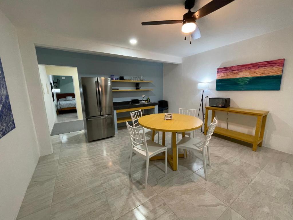 Kuchyň nebo kuchyňský kout v ubytování Casona Suites