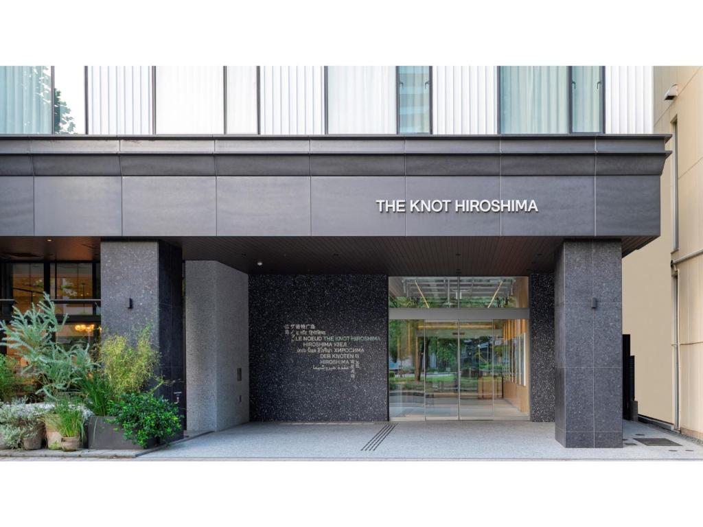 a building with a sign that reads the not incognito at THE KNOT HIROSHIMA - Vacation STAY 20580v in Hiroshima