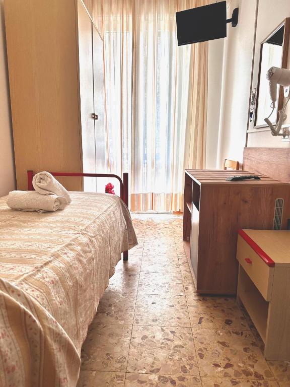 Postel nebo postele na pokoji v ubytování Hotel Edera