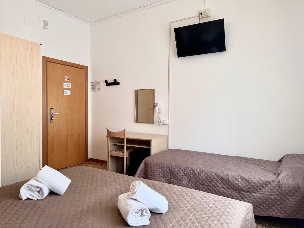 Postel nebo postele na pokoji v ubytování Hotel Edera