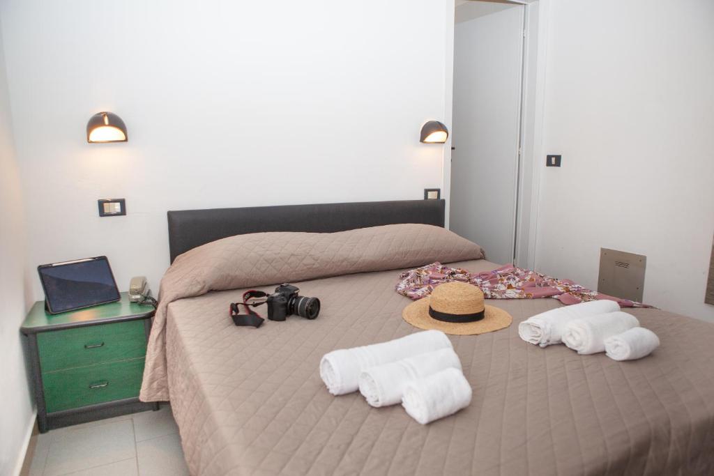 Postel nebo postele na pokoji v ubytování Hotel La Torretta Bramante