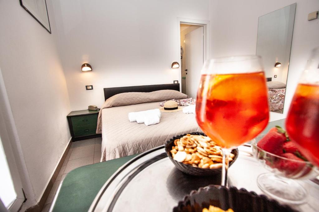 Postel nebo postele na pokoji v ubytování Hotel La Torretta Bramante