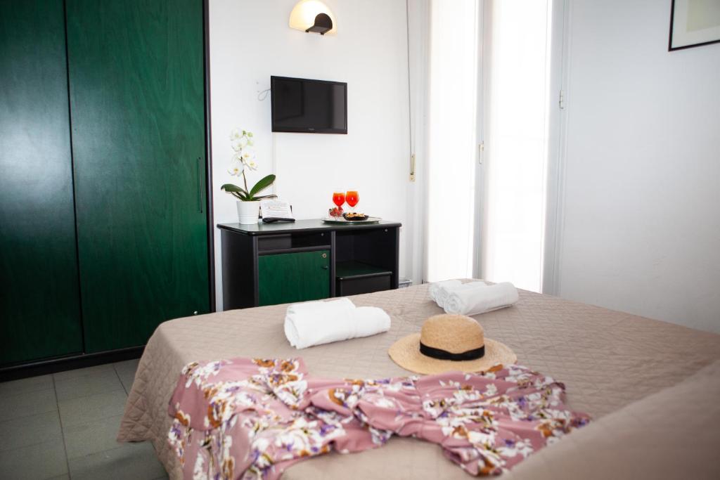 Postel nebo postele na pokoji v ubytování Hotel La Torretta Bramante