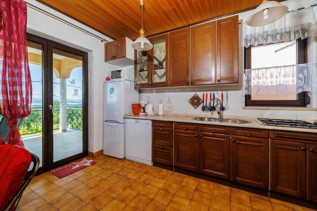 Kuchyň nebo kuchyňský kout v ubytování Apartment Katarina
