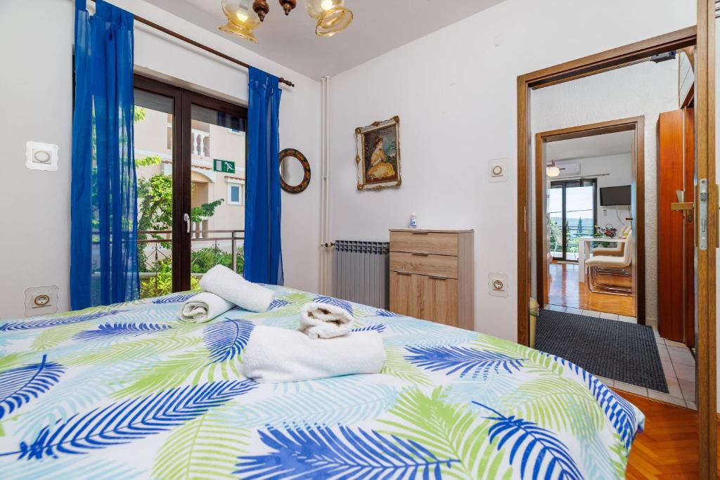 Postel nebo postele na pokoji v ubytování Apartment Katarina