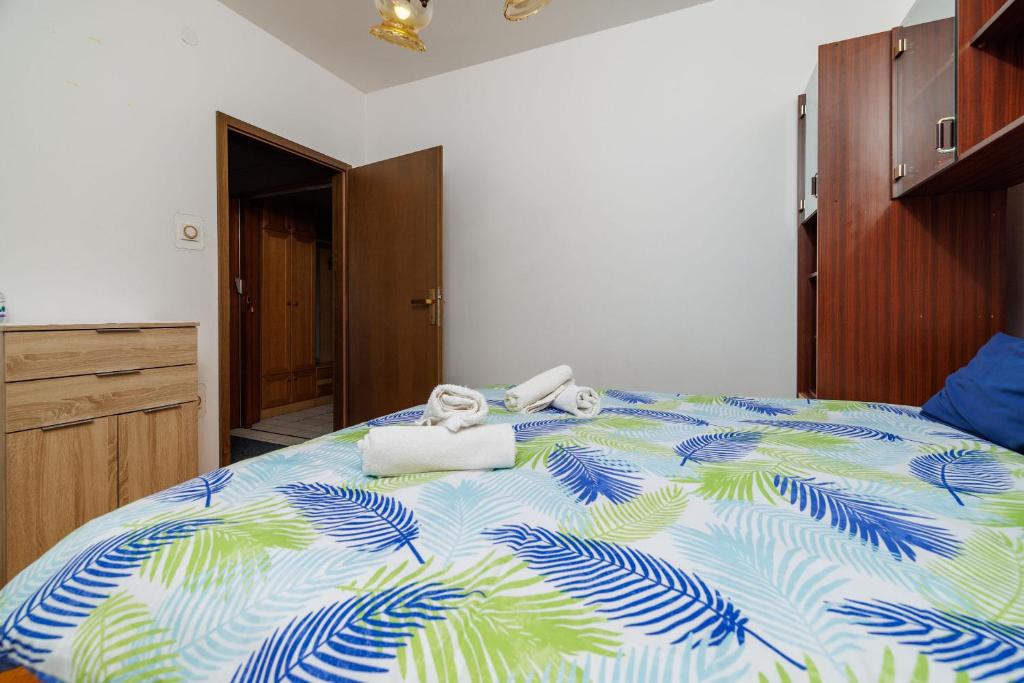 Postel nebo postele na pokoji v ubytování Apartment Katarina