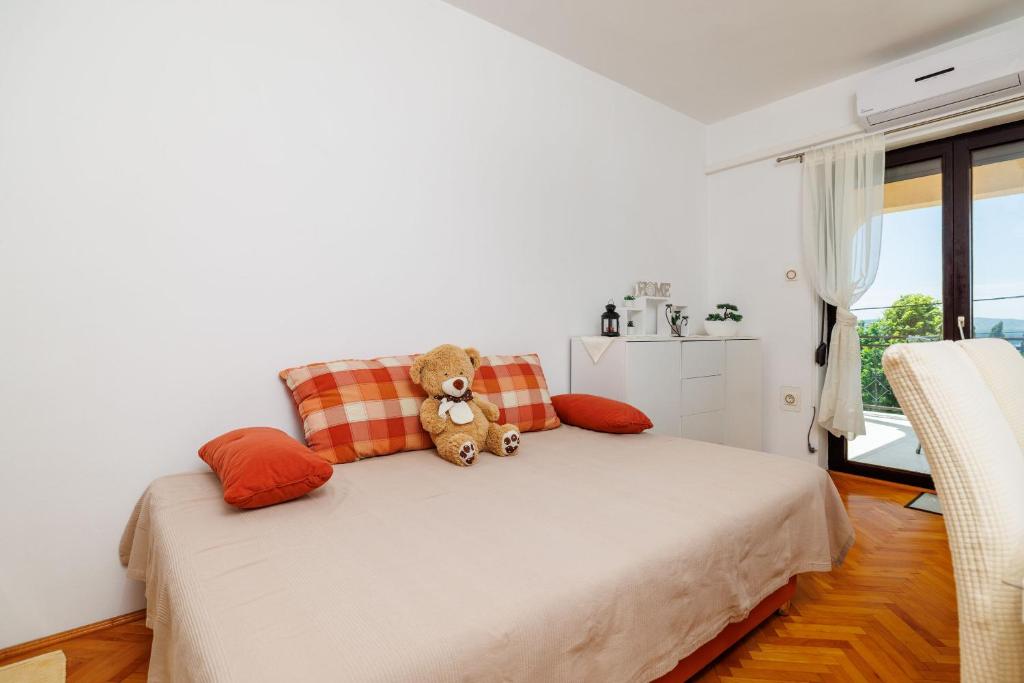 Postel nebo postele na pokoji v ubytování Apartment Katarina