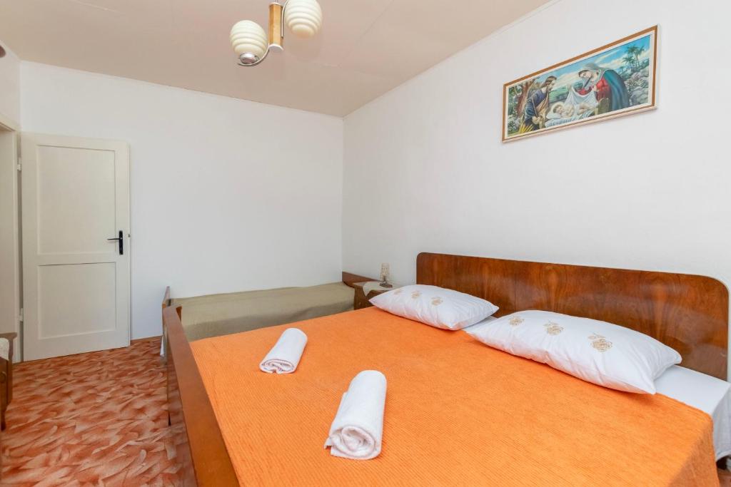 Postel nebo postele na pokoji v ubytování House Villa Marija