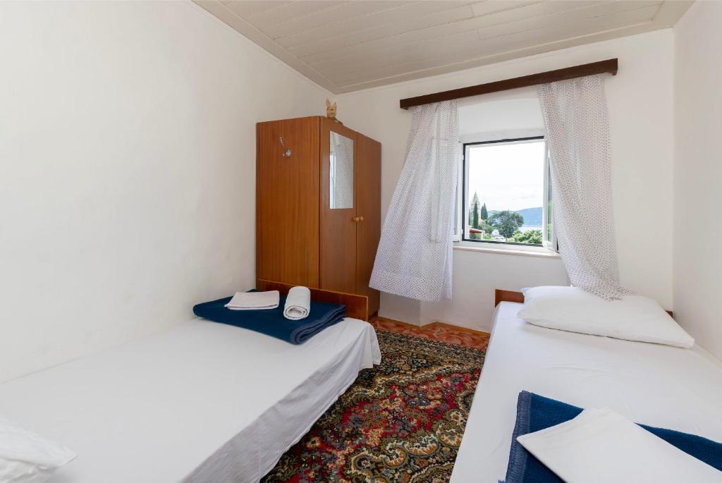 Postel nebo postele na pokoji v ubytování House Villa Marija