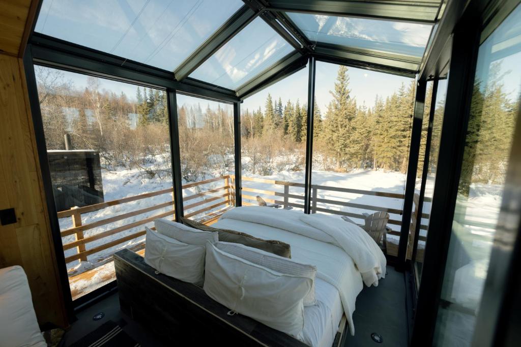 Ένα ή περισσότερα κρεβάτια σε δωμάτιο στο Wilding Hotels Fairbanks