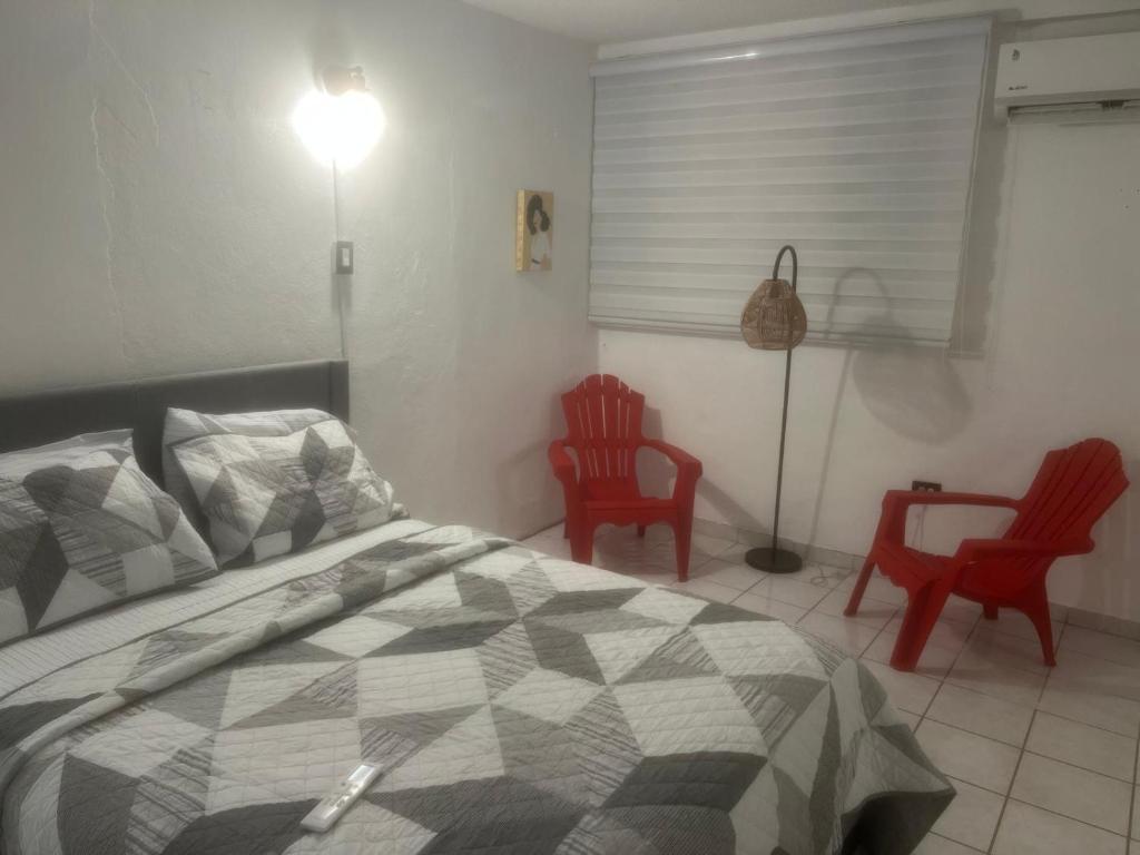 Ένα ή περισσότερα κρεβάτια σε δωμάτιο στο Levitt Beach 1
