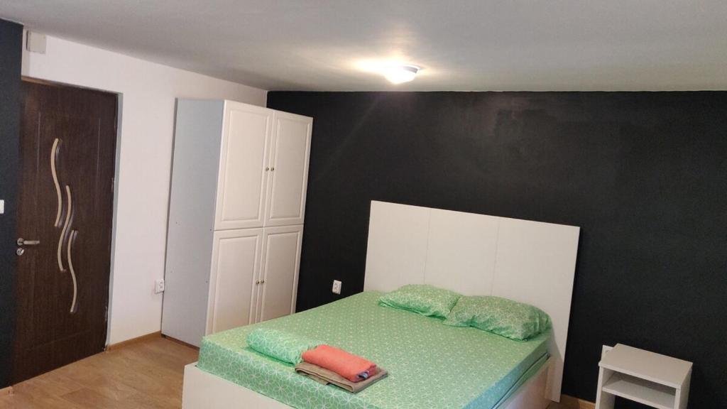 Кровать или кровати в номере Iris studio spacious apartment