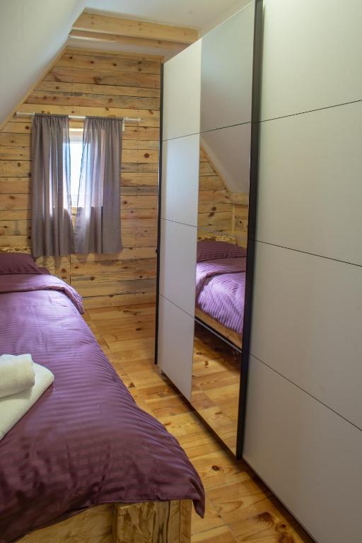 Postel nebo postele na pokoji v ubytování Sunny Village - Vila Otter