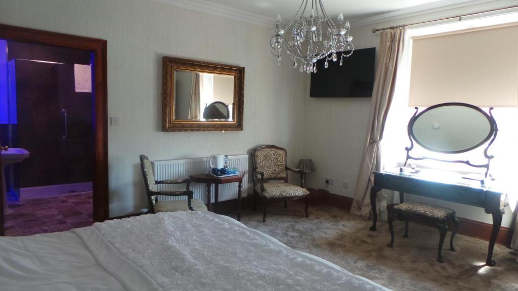 A bed or beds in a room at St Michaels Guest House