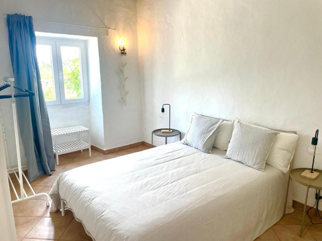 Postel nebo postele na pokoji v ubytování Toca das Manas