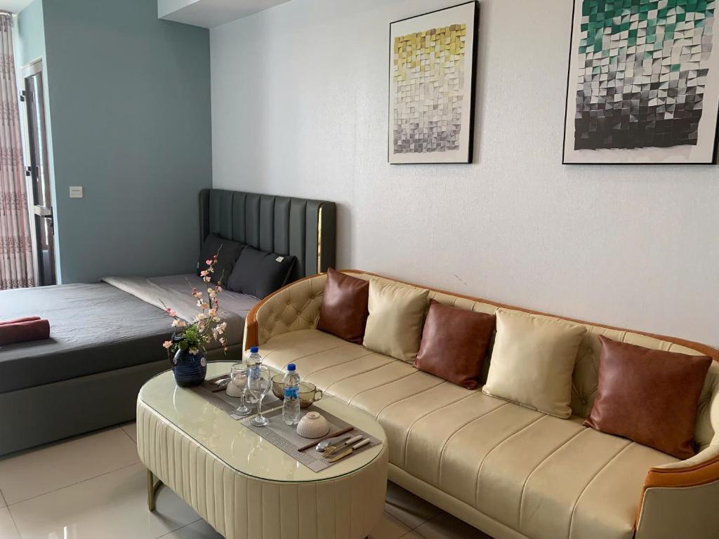 Posezení v ubytování Olala Saigon Apartment in Rivergate Building