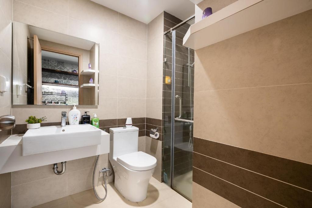 Koupelna v ubytování Olala Saigon Apartment in Rivergate Building
