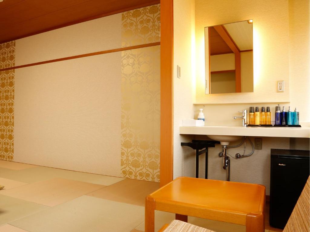 Kuchyň nebo kuchyňský kout v ubytování Arima Hot Spring Ryokan Kotori