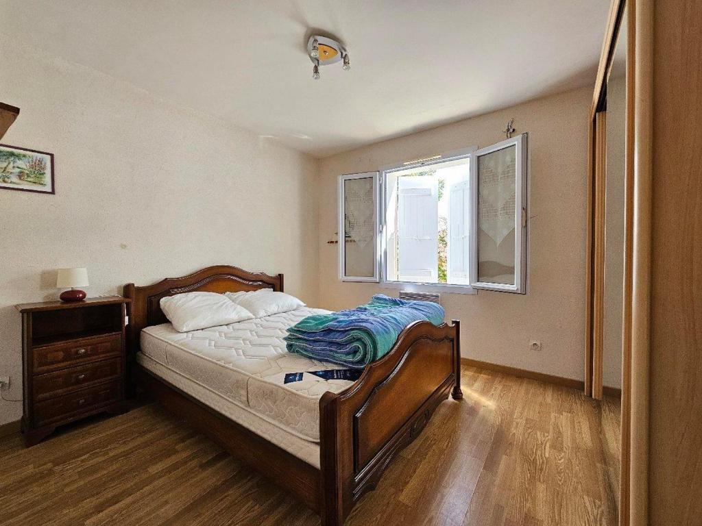 Posteľ alebo postele v izbe v ubytovaní Villa confortable avec jardin - animaux sur demande - FR-1-476-193