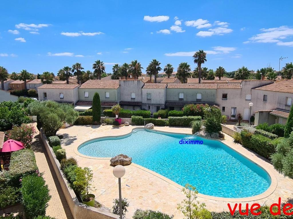 Photo de la galerie de l'établissement Appart spacieux 6 pers avec clim et parking - FR-1-781-99, à Valras-Plage