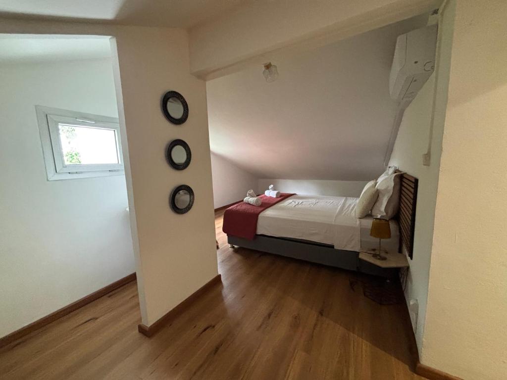 Postel nebo postele na pokoji v ubytování La Villa Manee
