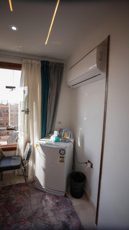 Postel nebo postele na pokoji v ubytování Giza pyramids hotel