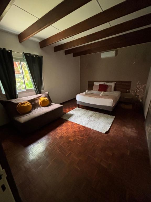 Postel nebo postele na pokoji v ubytování La Villa Manee