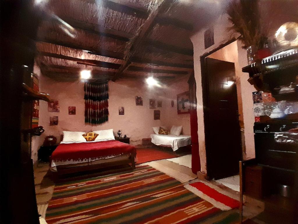 Postel nebo postele na pokoji v ubytování Giza Oasis Ein Koudra