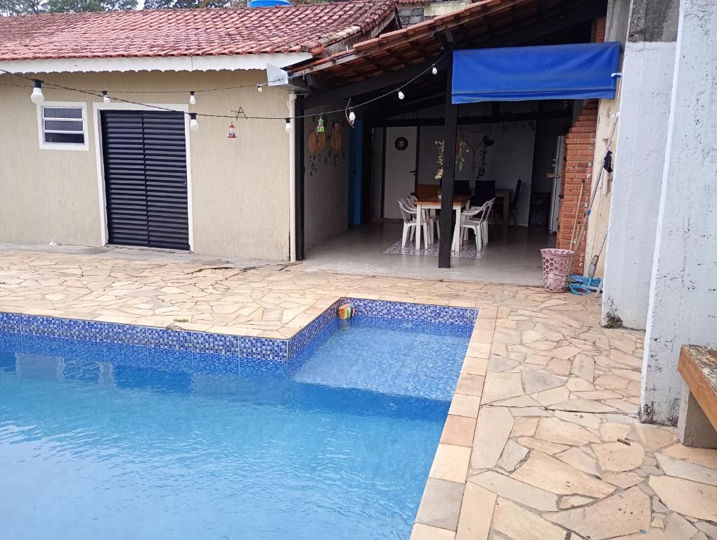 Bazén v ubytování Quarto Em Santana De Parnaiba nebo v jeho okolí