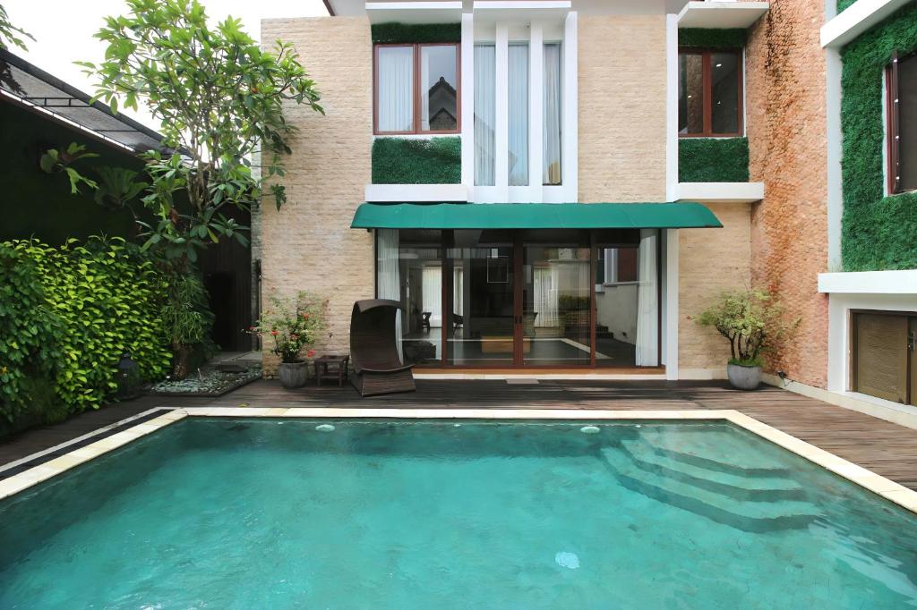 Swimmingpoolen hos eller tæt på Villa Maisha by REJA Villas