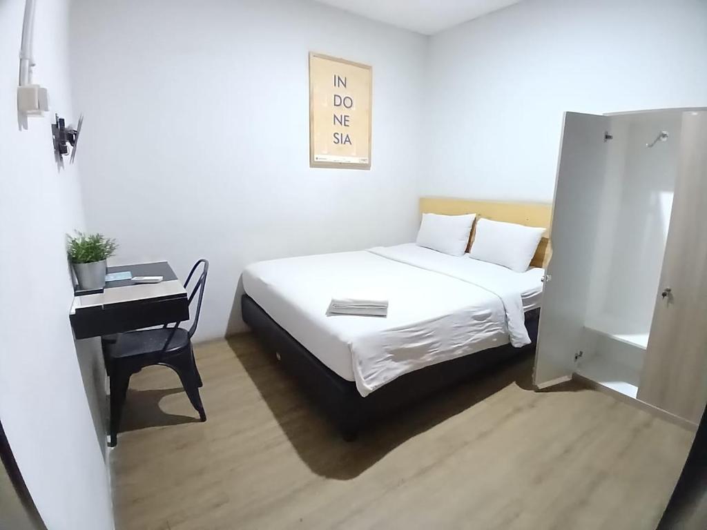 Ένα ή περισσότερα κρεβάτια σε δωμάτιο στο PINX'S HOSTEL
