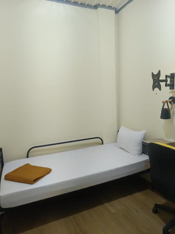 Ένα ή περισσότερα κρεβάτια σε δωμάτιο στο PINX'S HOSTEL