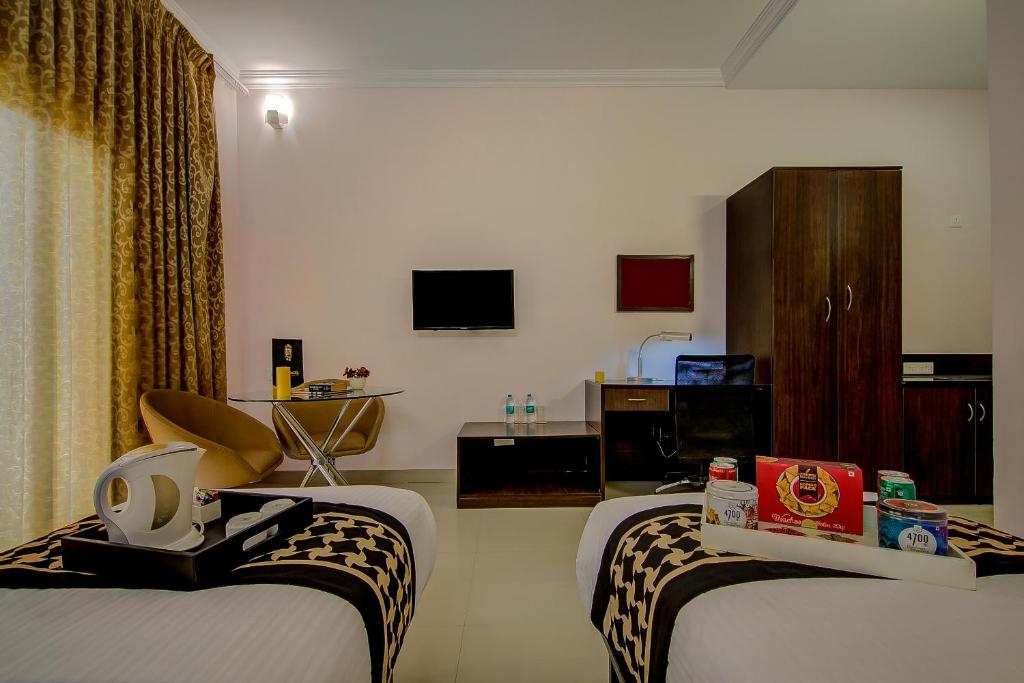 Postel nebo postele na pokoji v ubytování Hotel Krone Plaza Near IGI Airport Delhi