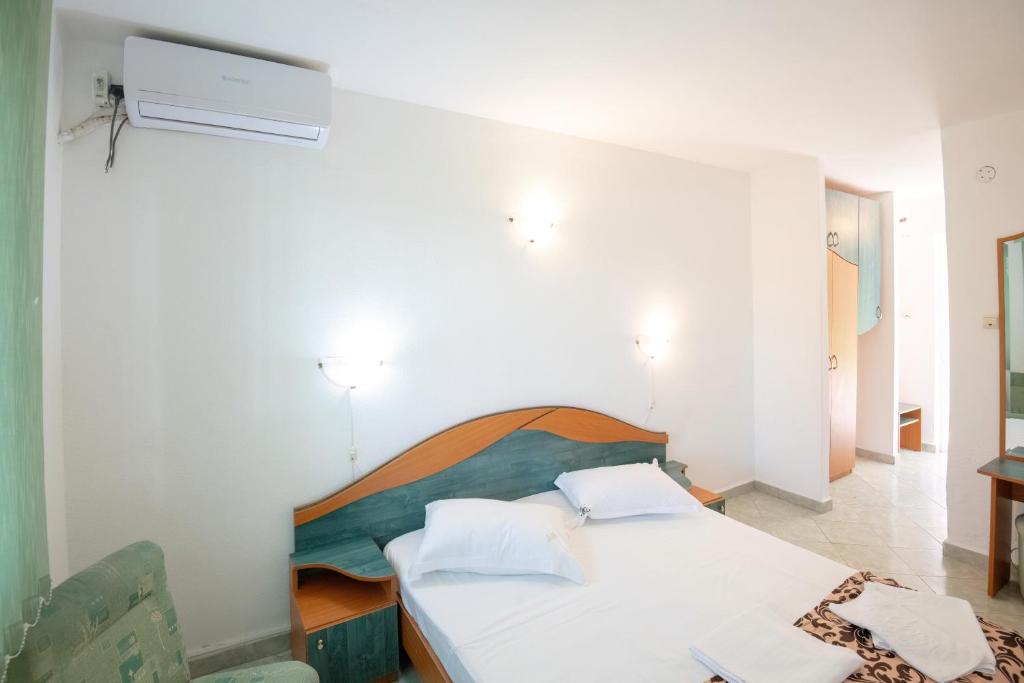 Postel nebo postele na pokoji v ubytování COMPLEX TISMANA 3* ALL INCLUSIVE