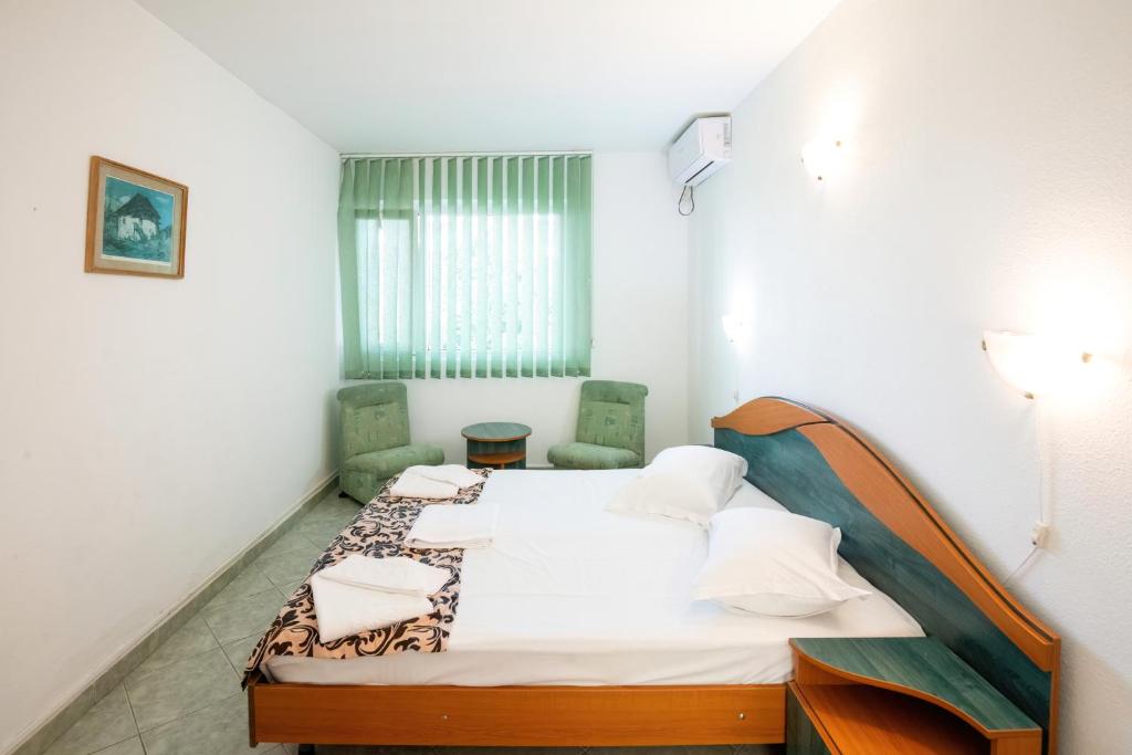 Postel nebo postele na pokoji v ubytování COMPLEX TISMANA 3* ALL INCLUSIVE