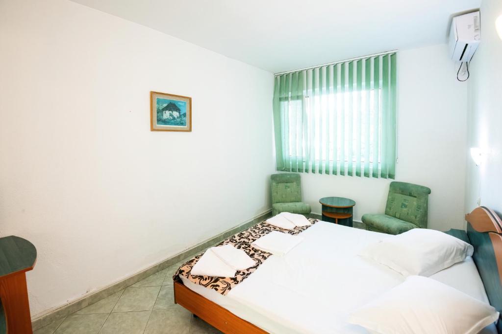 Postel nebo postele na pokoji v ubytování COMPLEX TISMANA 3* ALL INCLUSIVE