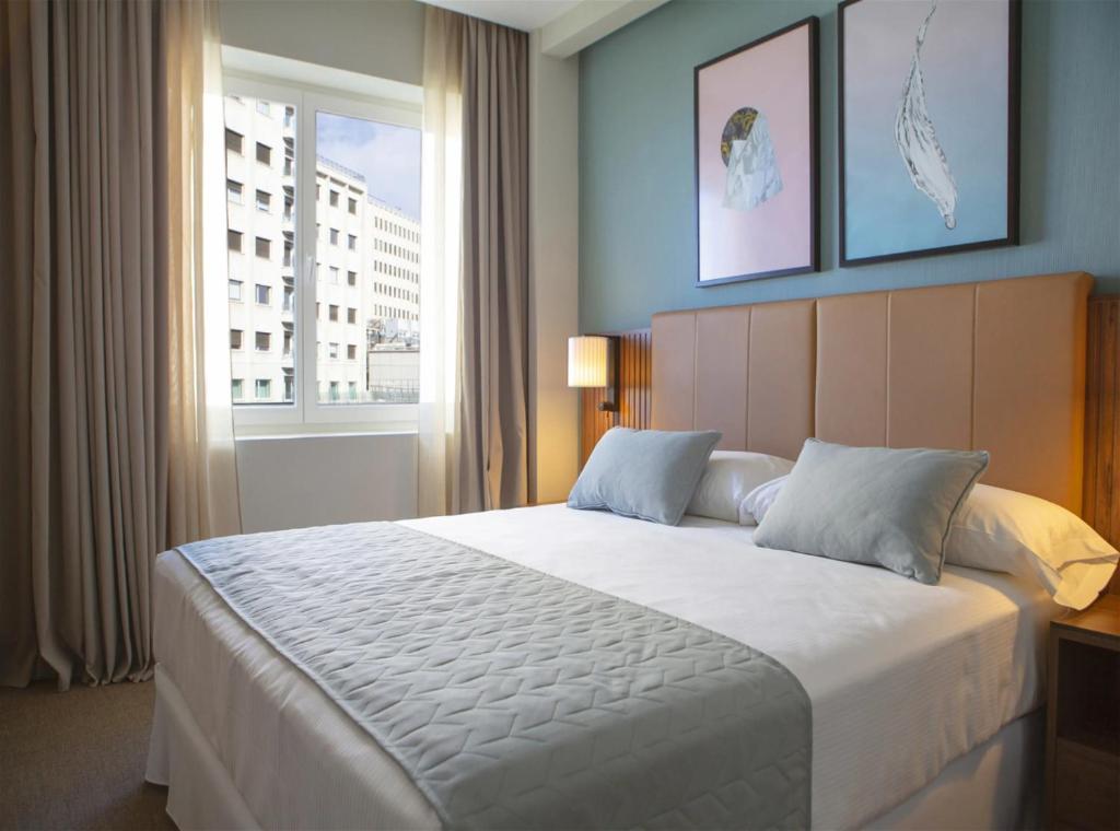 Postel nebo postele na pokoji v ubytování Hotel Grand Haven wood suites Delhi Airport