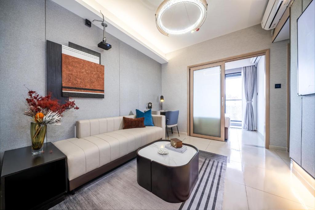 Posezení v ubytování Kingkey Shuibei International Apartment Hotel
