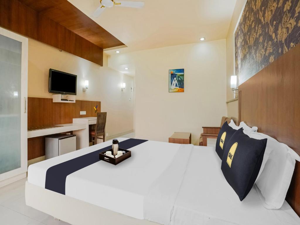Postel nebo postele na pokoji v ubytování Hotel Grand le mount