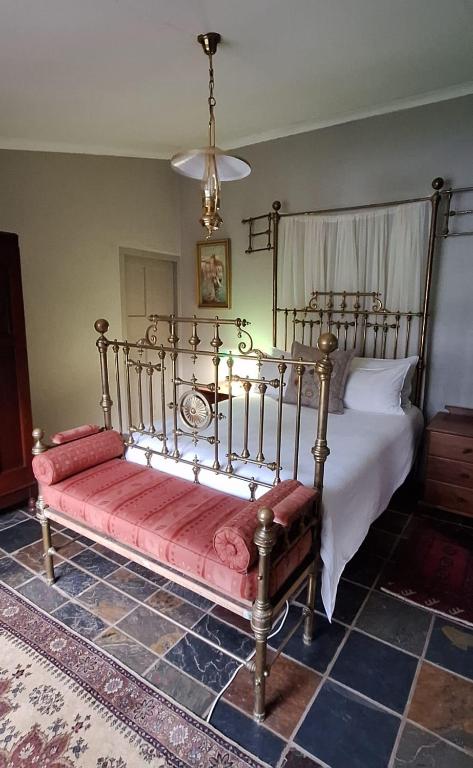 Letto o letti in una camera di Carlsruhe Private Game Reserve Cullinan