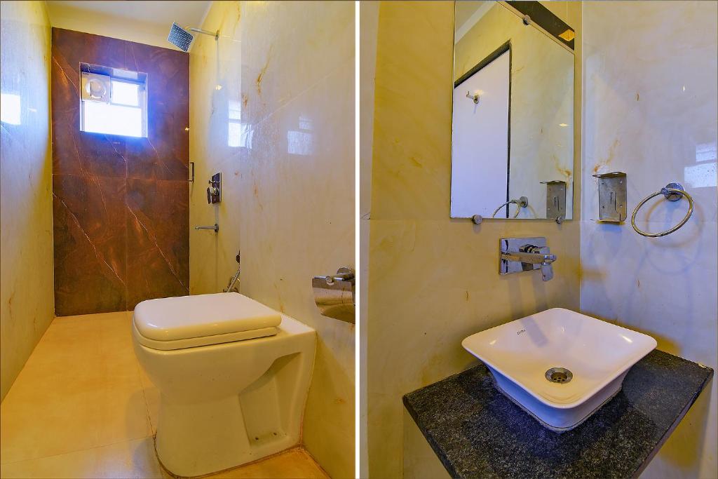 Koupelna v ubytování FabHotel Manomay Homes