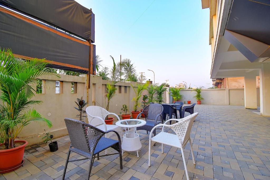 Balkón nebo terasa v ubytování FabHotel Manomay Homes