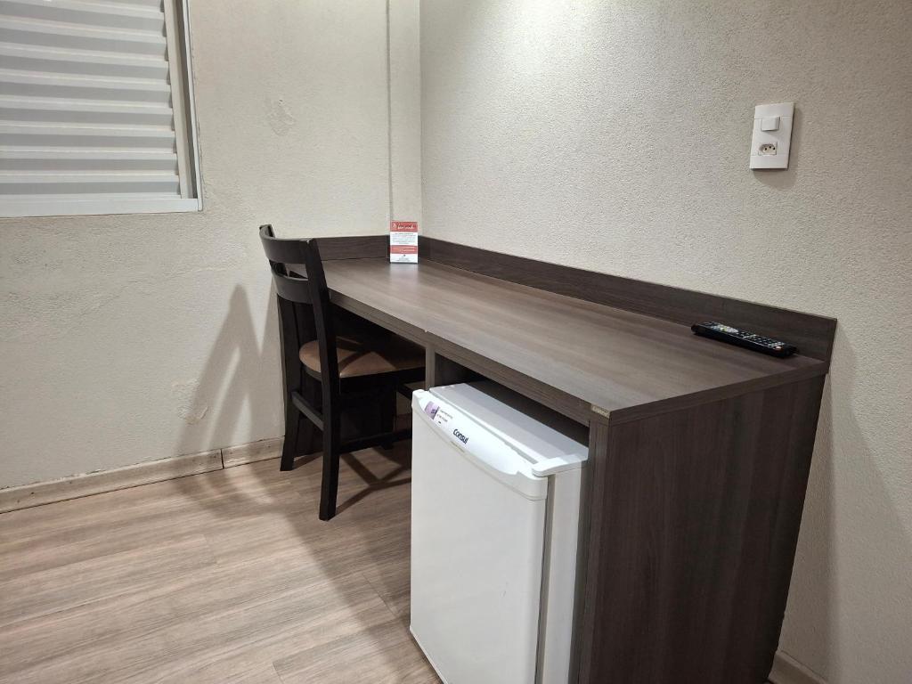 Kuchyň nebo kuchyňský kout v ubytování Ônix Inn Hotel Cravinhos