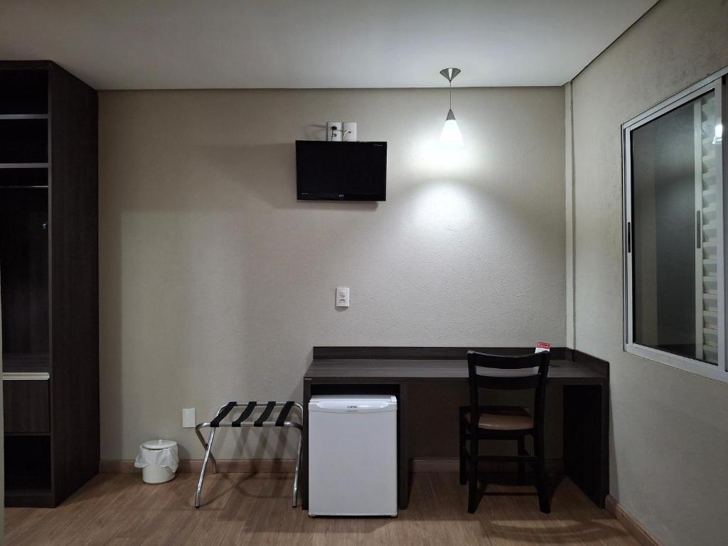 Kuchyň nebo kuchyňský kout v ubytování Ônix Inn Hotel Cravinhos