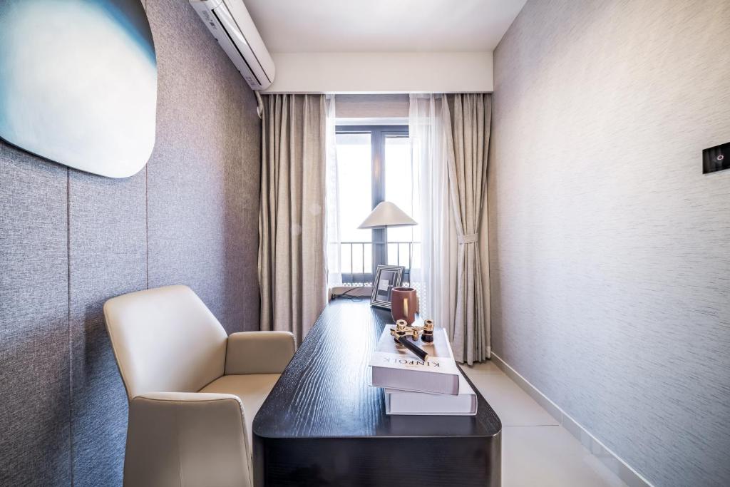 Posezení v ubytování Kingkey Shuibei International Apartment Hotel
