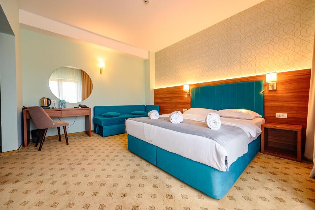 Postel nebo postele na pokoji v ubytování Hotel Ryon