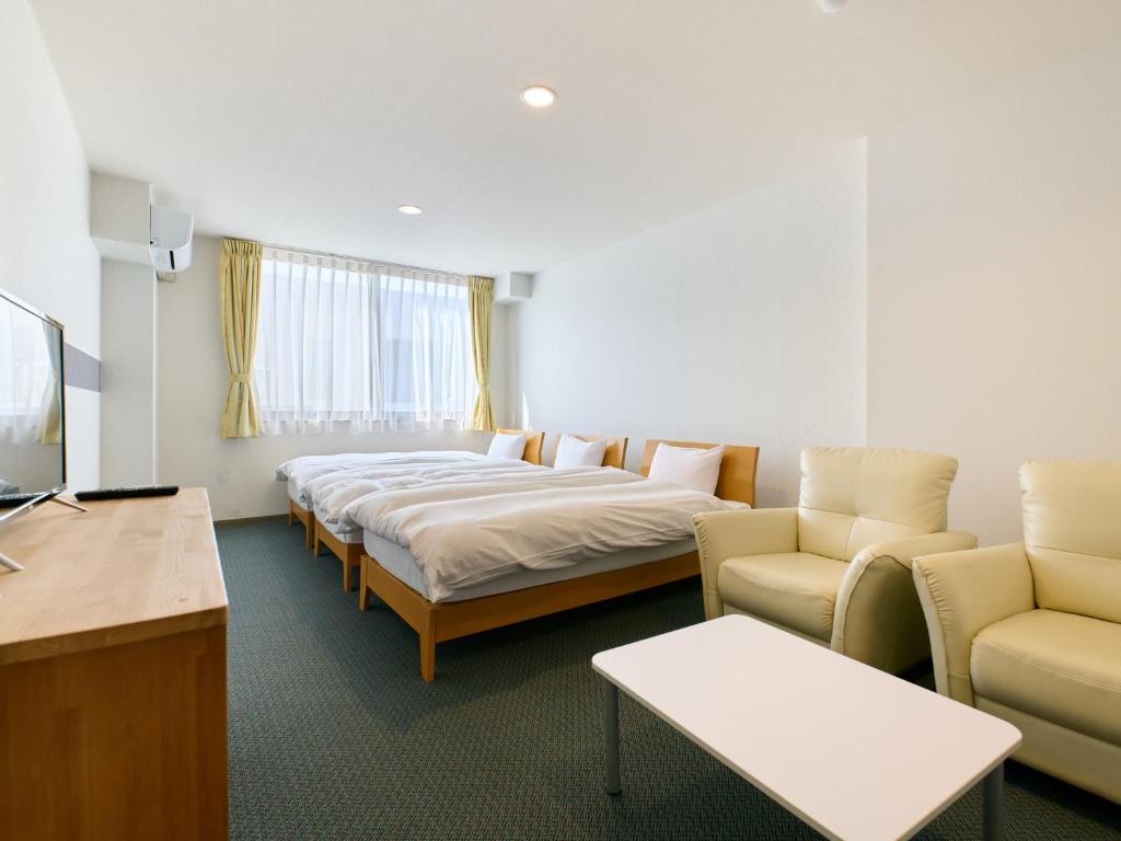 TV a/nebo společenská místnost v ubytování Owara View Hotel