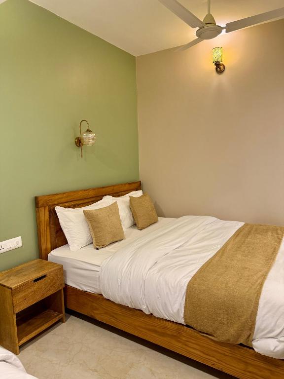 Postel nebo postele na pokoji v ubytování Paramount Apartment & Rooms