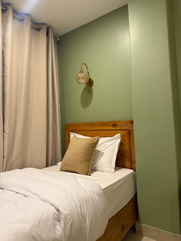 Postel nebo postele na pokoji v ubytování Paramount Apartment & Rooms