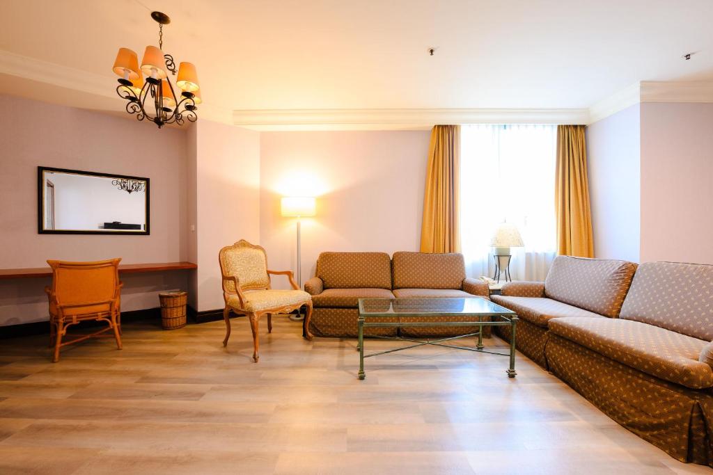 Posezení v ubytování Wei-Yat Grand Hotel